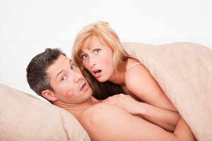 Mann und Frau im Bett